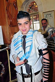 Bar Mitzvah (Hebrew: ?? ????) and Bat Mitzvah (Hebrew: ?? ????) are Jewish coming of age rituals. Bar "??" is a Jewish Babylonian Aramaic word literally meaning son, in Hebrew it's Ben "??". Bat "??" is Hebrew for girl, and Mitzvah "????" is a commandment and a law. While this literally translates to "son of the law" or "daughter of the law", the rabbinical phrase "bar" means here "under the category of" or "subject to", making "Bar Mitzvah" translate to "an [agent] who is subject to the law". According to Jewish law, when Jewish boys become 13, they become accountable for their actions and become a Bar Mitzvah (plural: B'nai Mitzvah). A Bat Mitzvah occurs when Jewish girls become 12, and it means the same as it does for boys- a rite of passage from being considered unable to properly understand the Torah to being considered old enough to begin to understand and thus for boys and girls alike to be treated more like adults. In addition to being considered accountable for their actions from a religious perspective, B'nai mitzvah may be counted towards a minyan (prayer quorum) and may lead prayer and other religious services in the family and the community. The age of B'nai Mitzvah was selected because it roughly coincides with physical puberty. Prior to a child reaching Bar or Bat Mitzvah, the child's parents hold the responsibility for the child's actions. After this age, children bear their own responsibility for Jewish ritual law, tradition, and ethics and are able to participate in all areas of Jewish community life. 