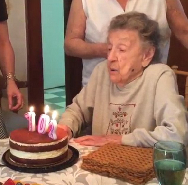 102 year old grandma blowing out her BDAY candles