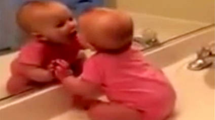 Baby Loves Her Reflection So Much She Kisses Herself!