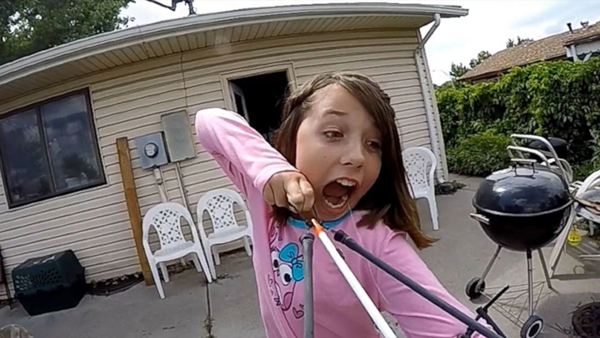 Girl Pulls Out Her Own Tooth with a Slingshot