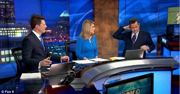 Hilarious moment weatherman finds HANGER in his suit