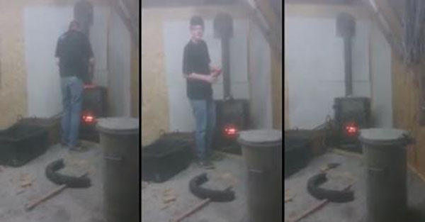Idiot throws an aerosol can into a fire stove