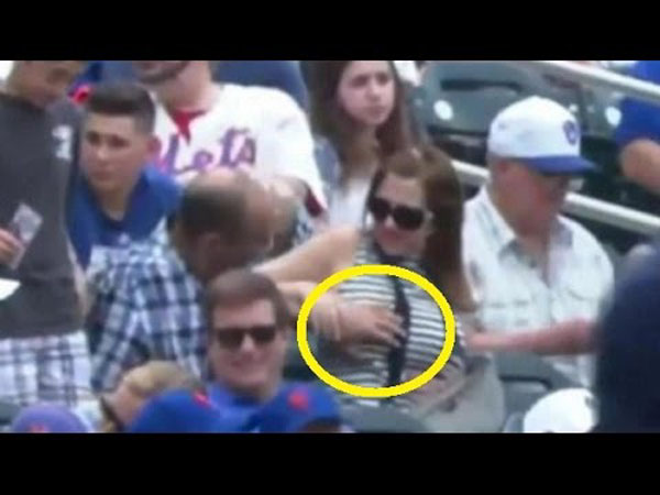 Man Caught Groping Woman's Breast at a Baseball Game