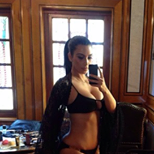 PHOTOS: Kim Kardashian Squeezes Into Kylie Jenner's Bikini