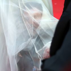 Prankster dives under America Ferrera's dress on Cannes red carpet