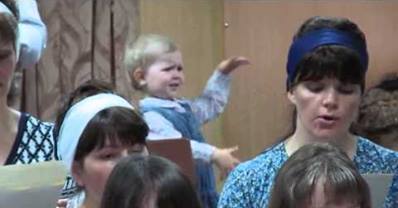 WATCH: Adorbale Little Lara is Conducting a Church Choir in Her Own Little World