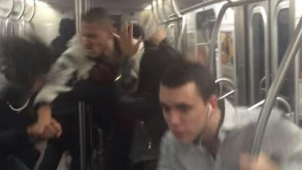 WATCH: Man Slaps Woman In The Face In Brutal F-Train Brawl