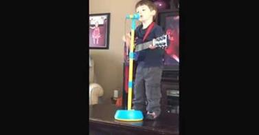 WATCH: Philliip Phillips Biggest Little Fans Perform His Song 'Raging Fire'