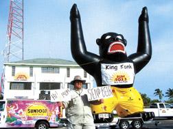 Keys Dan (aka Dan Gilson), pauses in front of King Konk, the Sun 103.1 gorilla that's been sighted all over the Upper Keys. Keys Dan is the guy who knows how to inflate and haul around this rather large prop. The studio releasing the King Kong movie licensed a certain number of these around the country and Clear Channel got one for the Keys - and promptly renamed it King Konk, pronounced "Conch.''