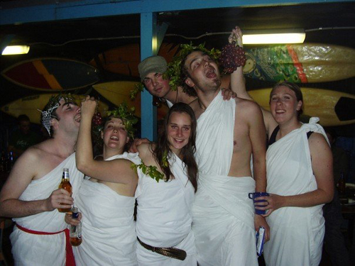 A typical attendee in a make-shift 'toga'A popular fad on college and university campuses in the United States and Canada, a toga party is a particular kind of costume party in which everyone wears a toga, or a semblance thereof, normally made from a bed sheet, and sandals. Toga parties were depicted in the 1978 film Animal House, which propelled the ritual into a widespread and enduring practice. Ivan Reitman was one of the producers of Animal House, who attended McMaster University and stayed in Whidden Hall, which is reputed to be the origin to the toga party. 