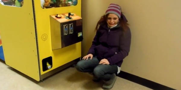 Woman Finally Beats Claw Machine, Emotions Run High