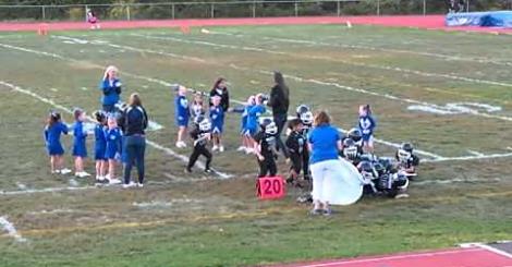 Youth Football Team VS Paper Banner: Who Wins? [Video]